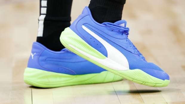 Blue and green Puma Fusion Nitro shoes.